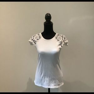 Soul Picked blouse with a decoration on the sleeve is in great condition.